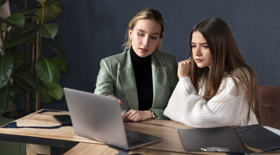 female-wedding-planner-working-with-client